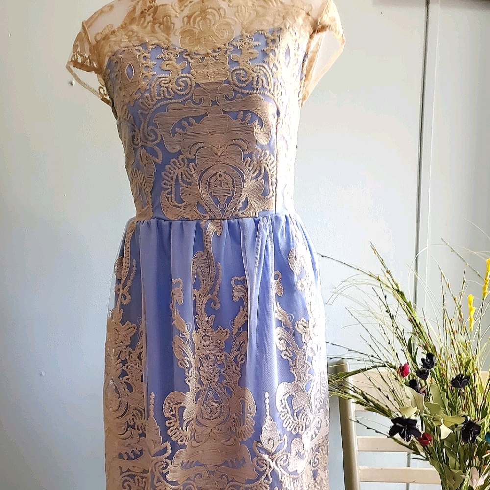 Item given to grandaughterPeriwinkle over layed with cream lace dress